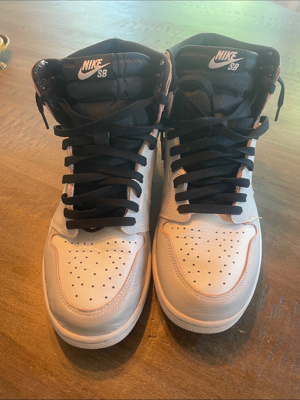 Nike SB High-Top Sneakers in White and Black with Orange Trim